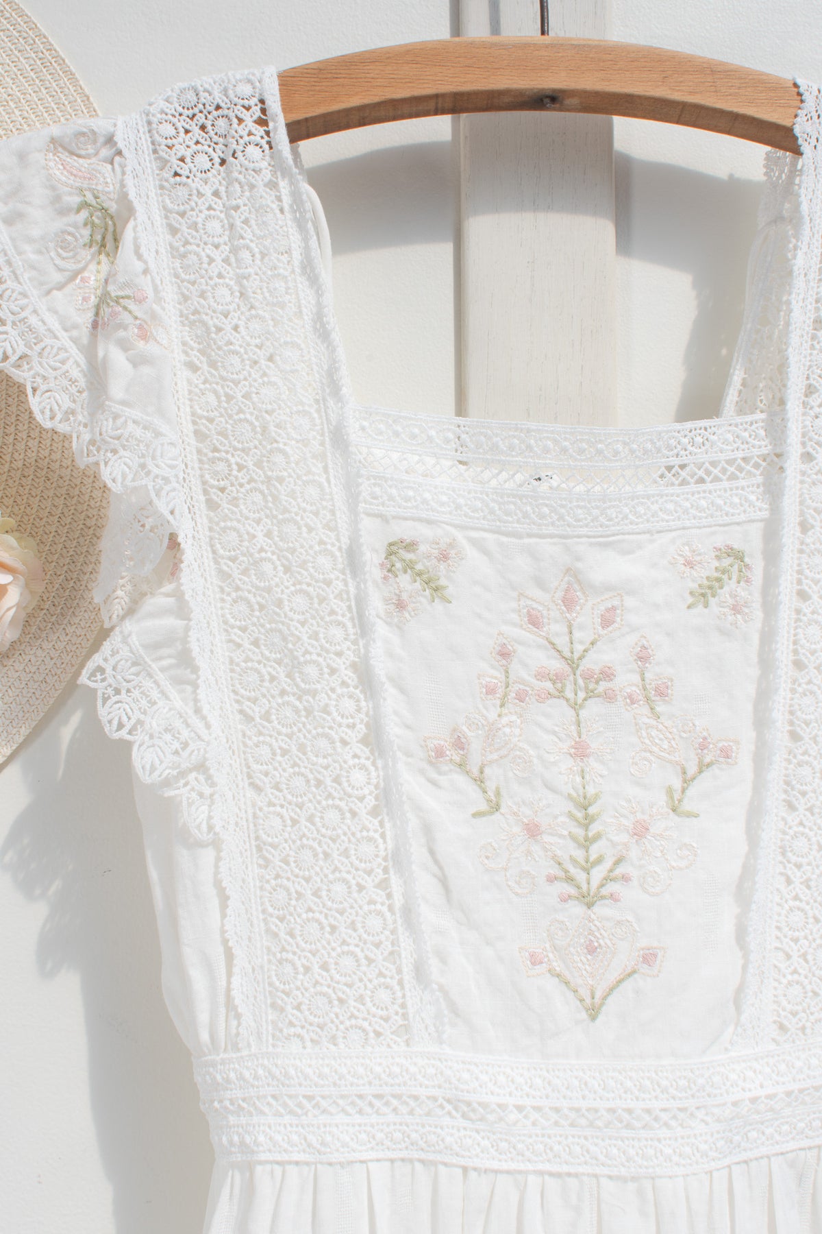 Lace bodice detail on white cotton midi dress