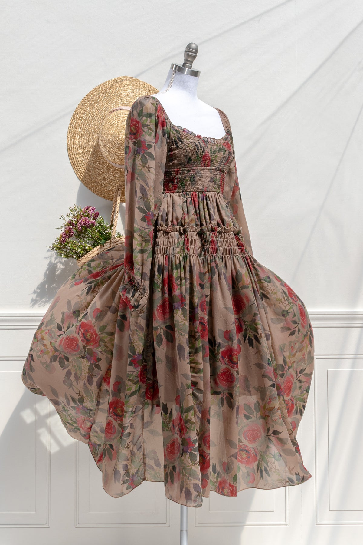 Hazel rose chiffon smocked midi dress — three-quarter view showing waist smocking and flowing skirt