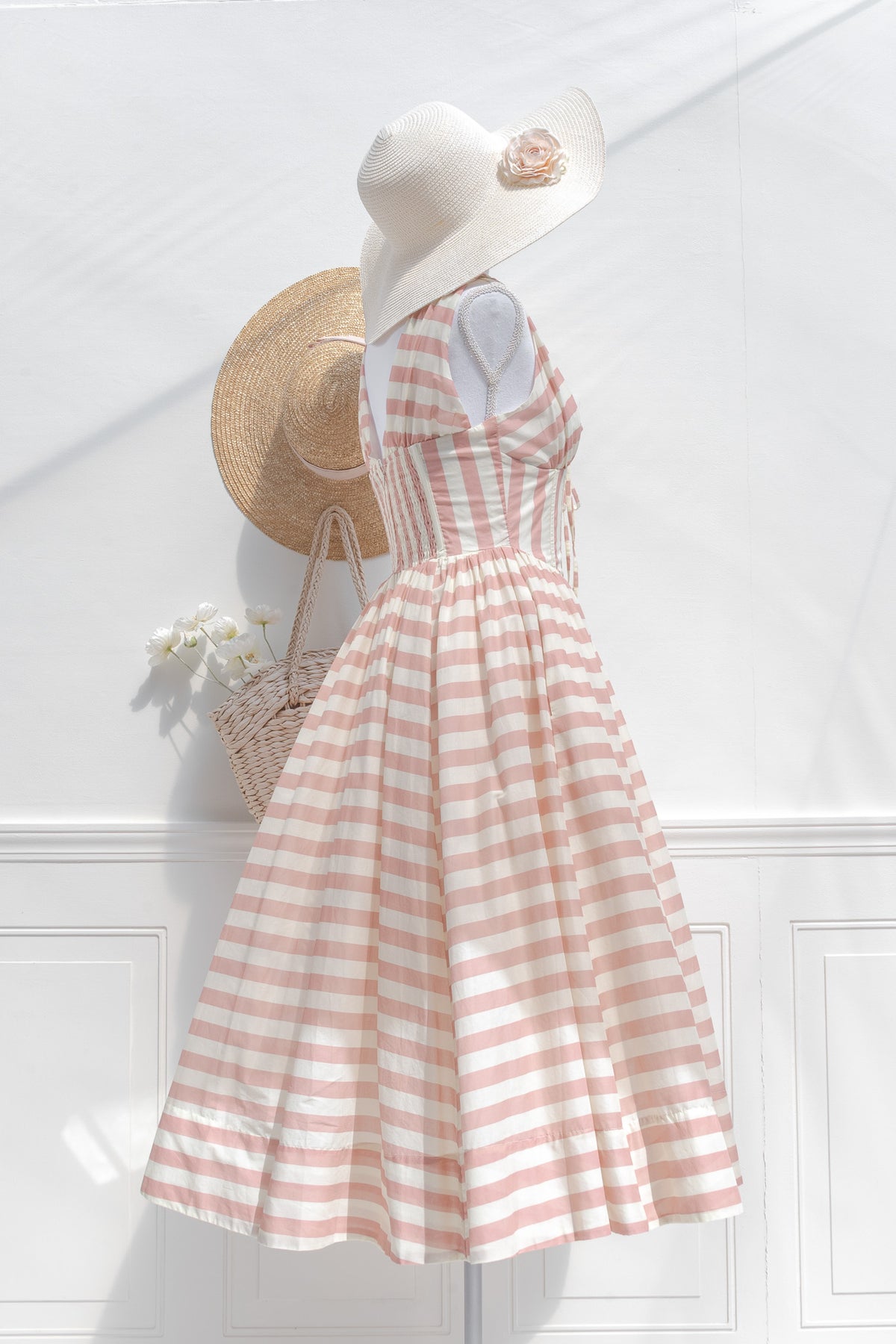 Blush striped midi dress with corset style paneling side view