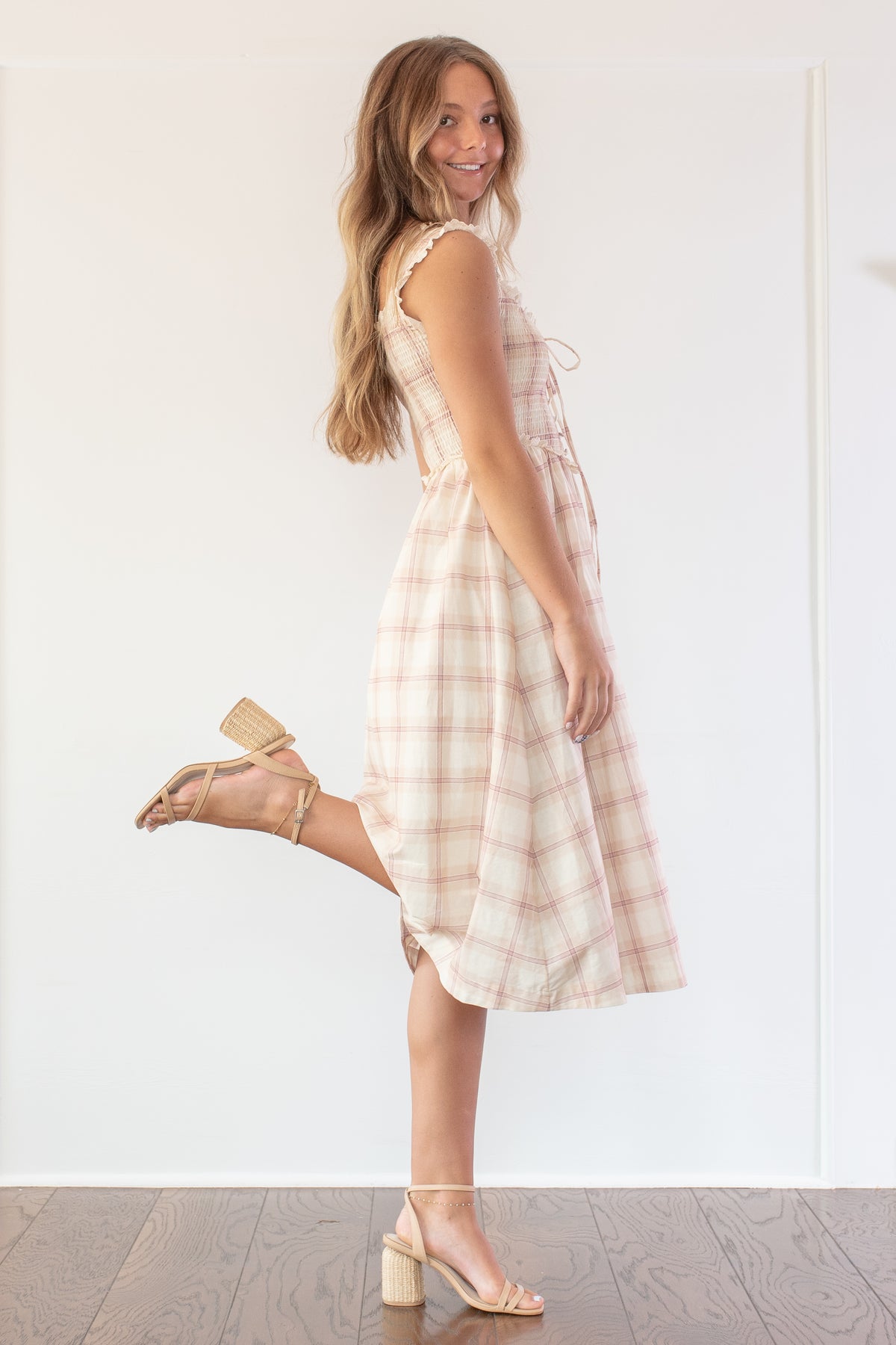 Beige plaid cotton smocked midi dress, a timeless summer piece styled full side view.