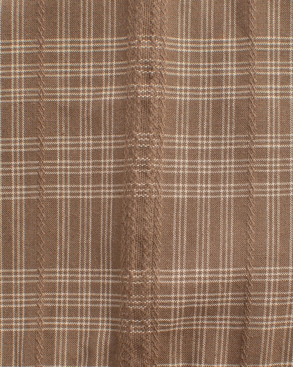 Brown woven plaid cotton fabric with cream lines, fabric detail view.