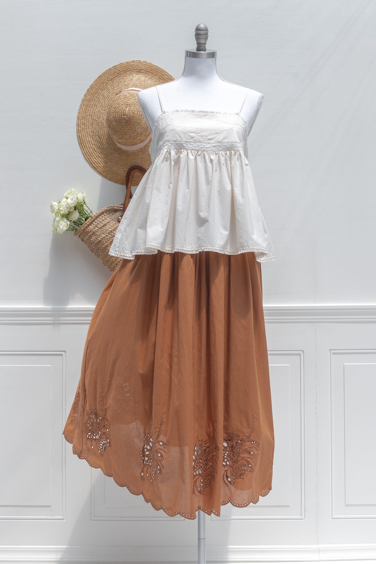 Chestnut cotton midi skirt styled with a cropped ruffled top, front view.