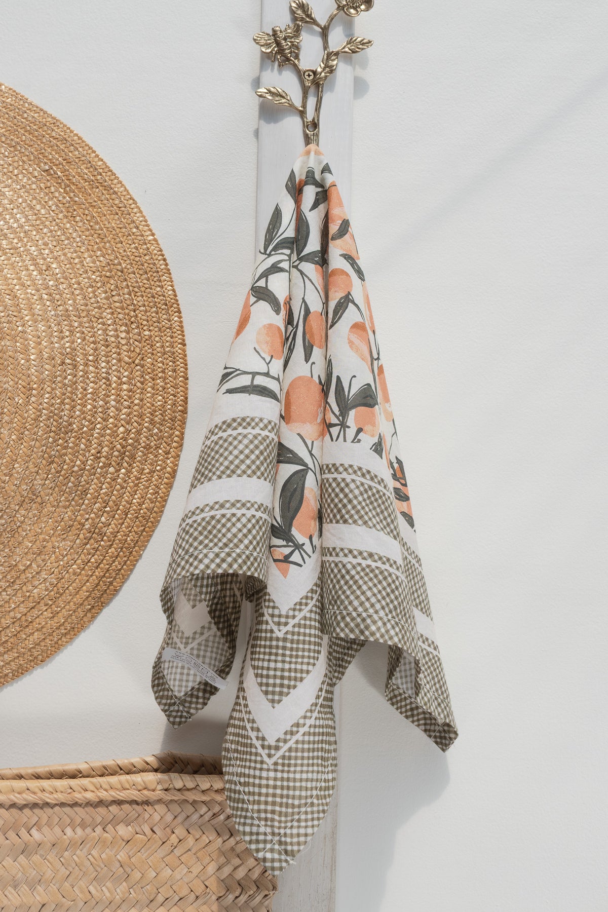 Cream cotton voile scarf shown hanging, full view.