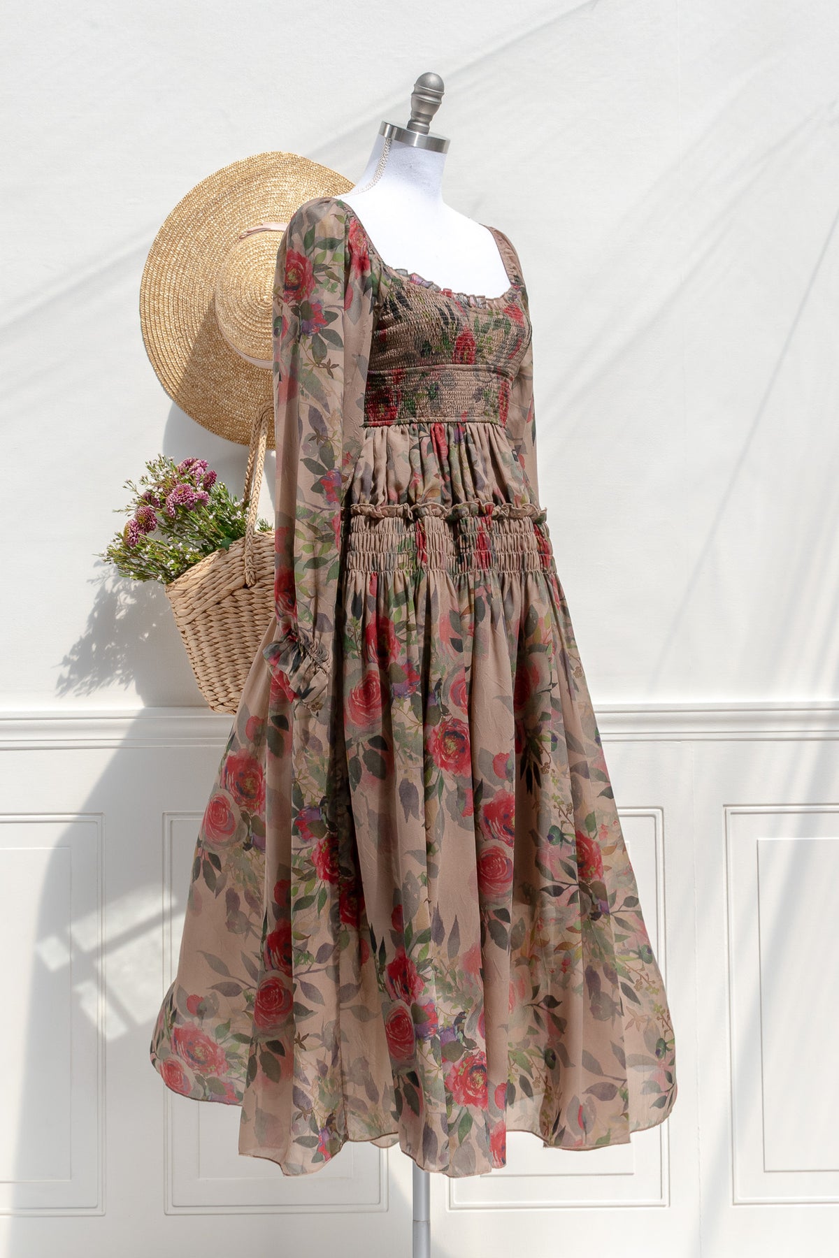 Hazel rose chiffon smocked midi dress — three-quarter view showing waist smocking and flowing skirt 2