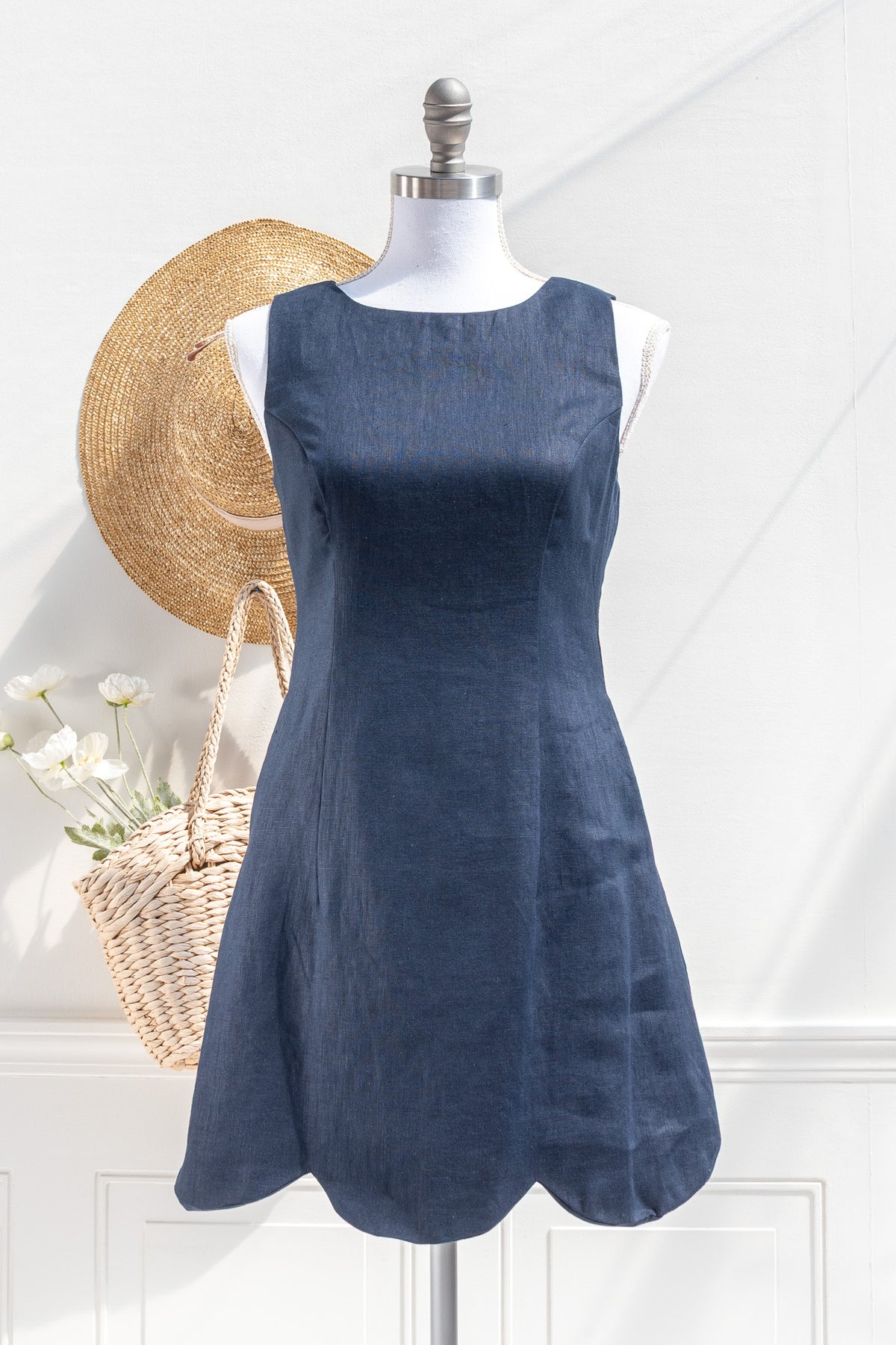 Navy linen cotton mini dress with scalloped hem and princess seams front view