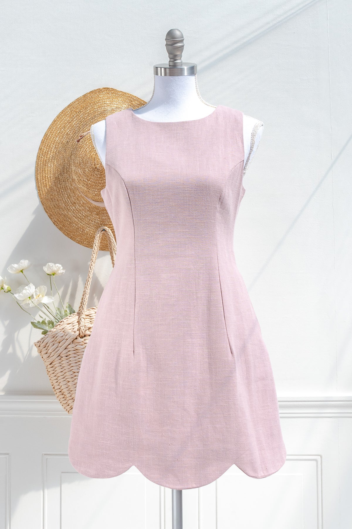 Pink linen cotton mini dress with scalloped hem — front view