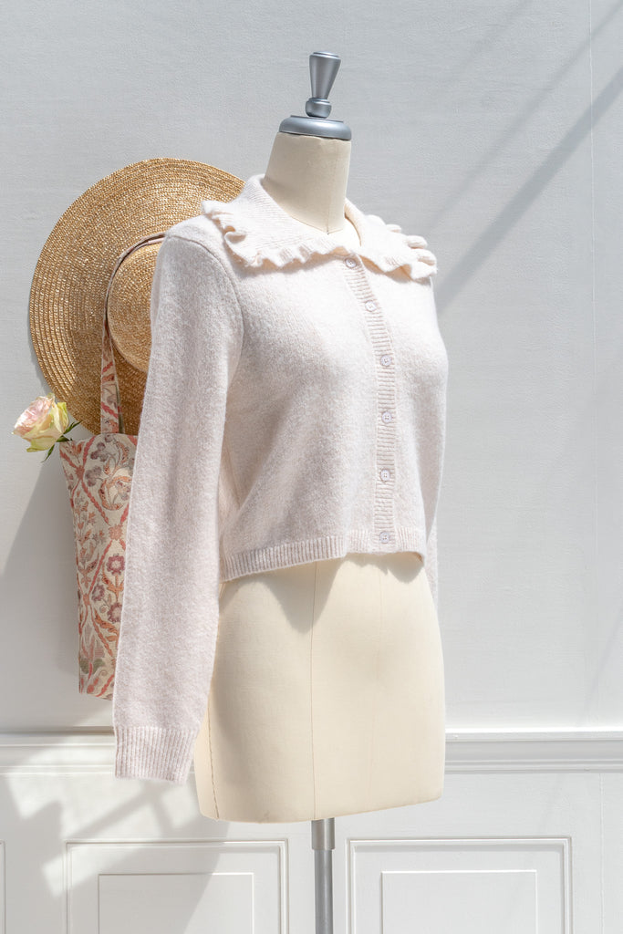 Amantine Camille blush ruffle-collar cropped cardigan — 3/4 view showing collar detail