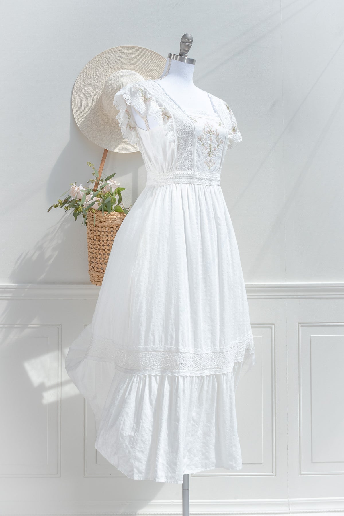White lace trim midi dress with flowing skirt three quarter view