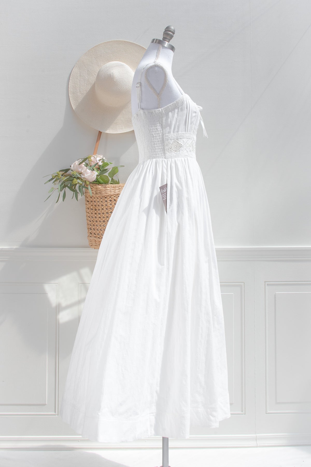 White midi dress with lace waist detail and side pockets side view
