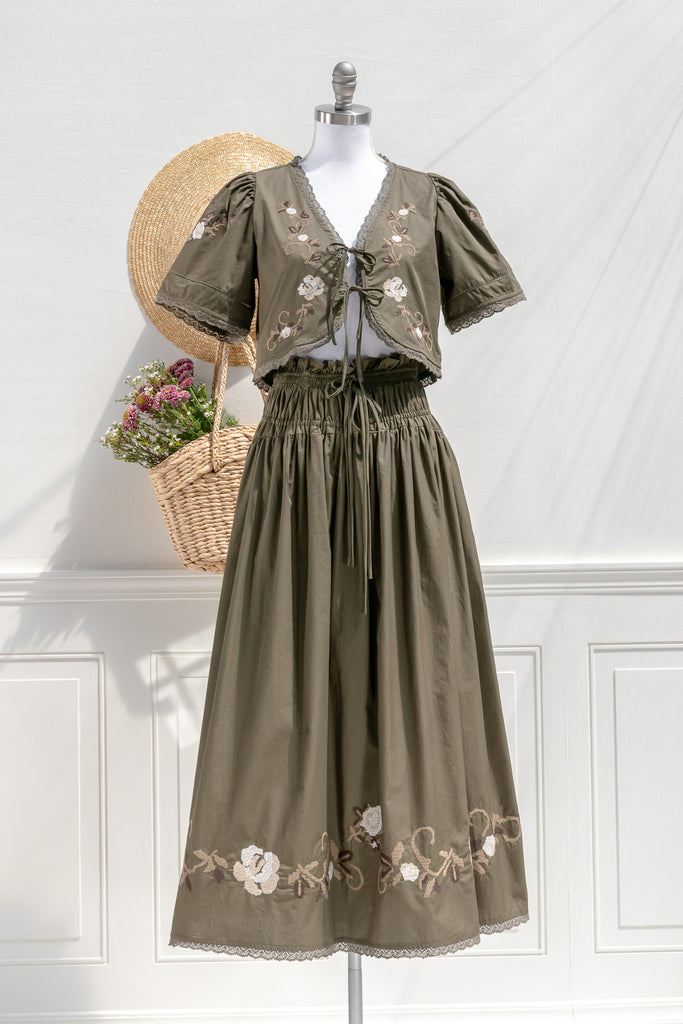 Amantine Sabrina embroidered cotton two-piece set in olive — tie-front top and smocked midi skirt with pockets, front view