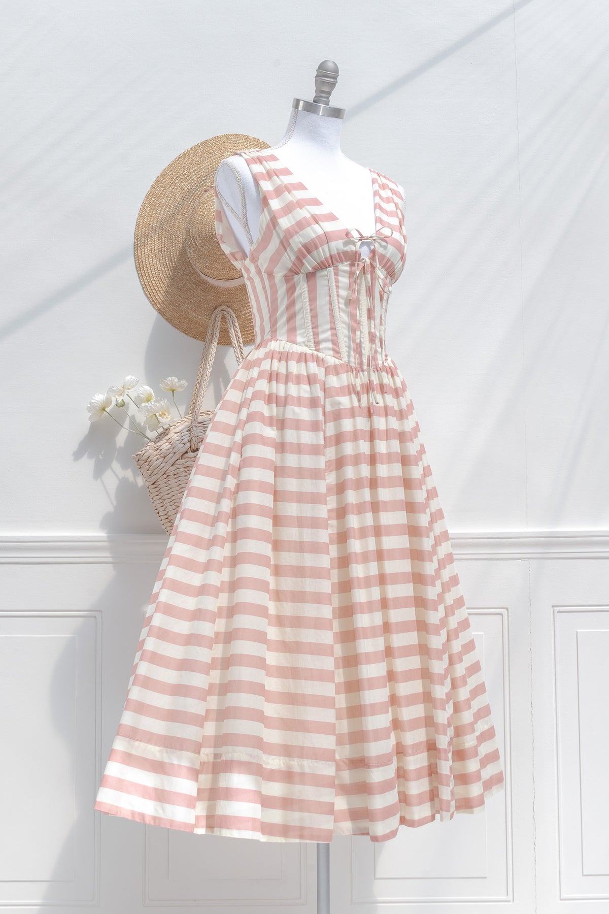 Striped cotton midi dress with structured bodice and full skirt three quarter view