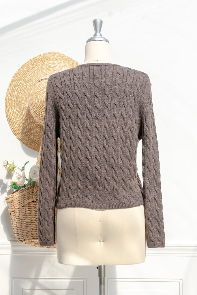 Teddy cocoa cardigan — back view with allover cable knit and ribbed hem