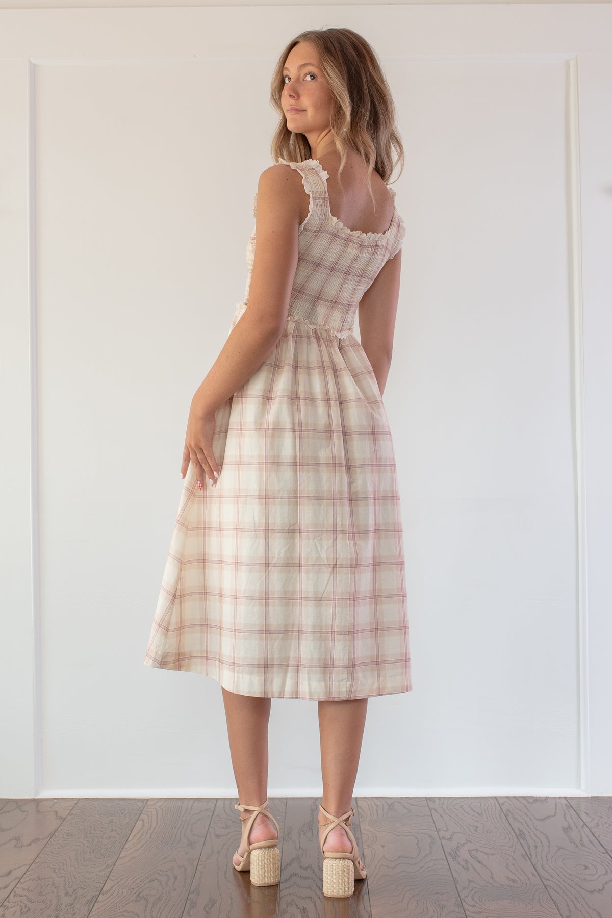 Beige plaid cotton smocked midi dress, model styled back view.