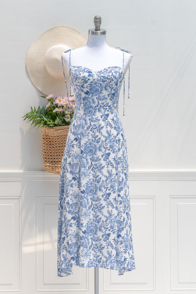 feminine french style dress - a beautiful blue floral on white dress. sweetheart neckline, spaghetti dress, perfect for summer brunches, dates, and even for workwear. front view. amantine.