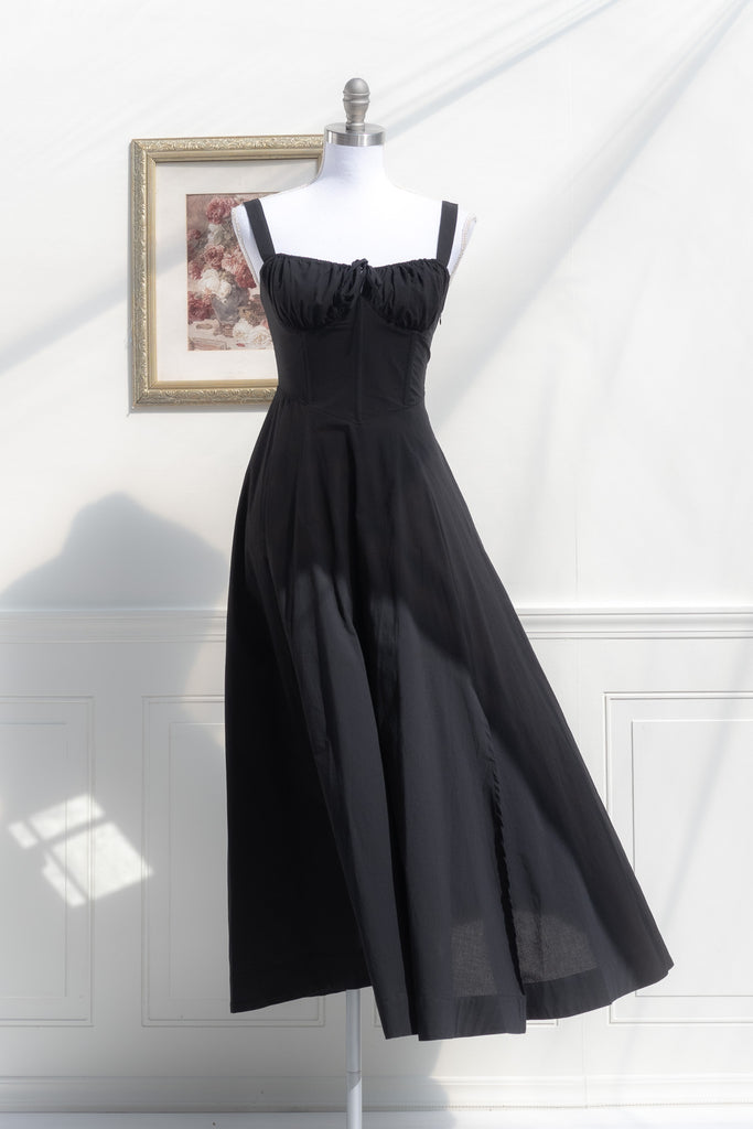 long black cottagecore dress - corset bust, shoulder straps, elegant cottage core dress for fall. front view. 