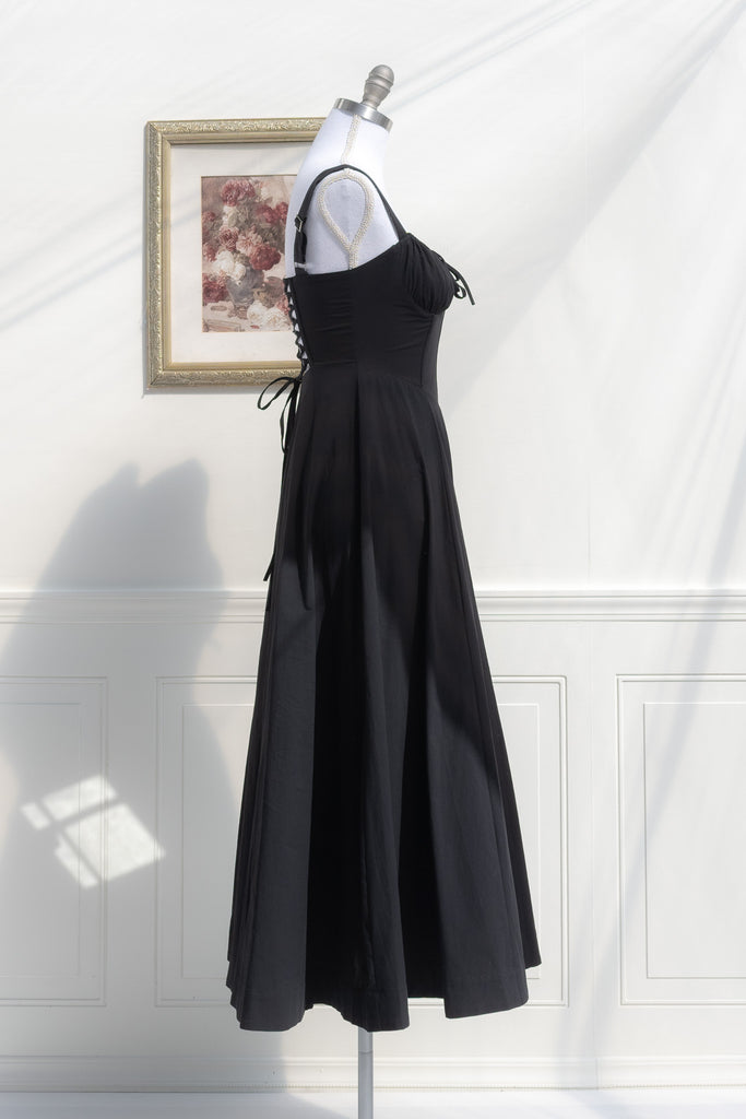 long black cottagecore dress - corset bust, shoulder straps, elegant cottage core dress for fall. side view. 