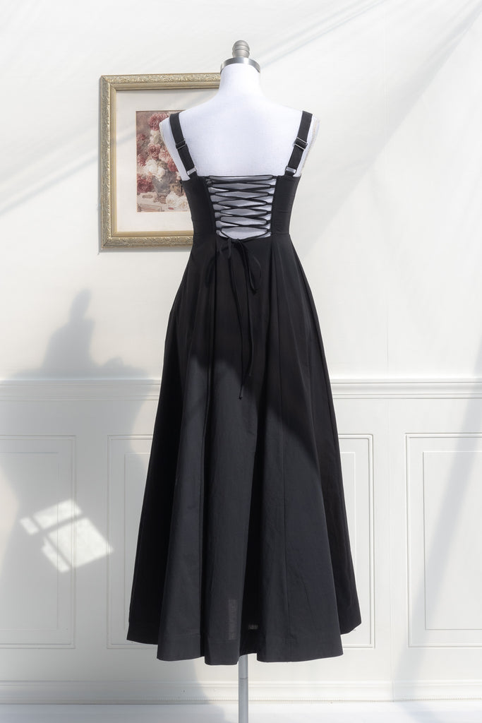 long black cottagecore dress - corset bust, shoulder straps, elegant cottage core dress for fall. back view. 