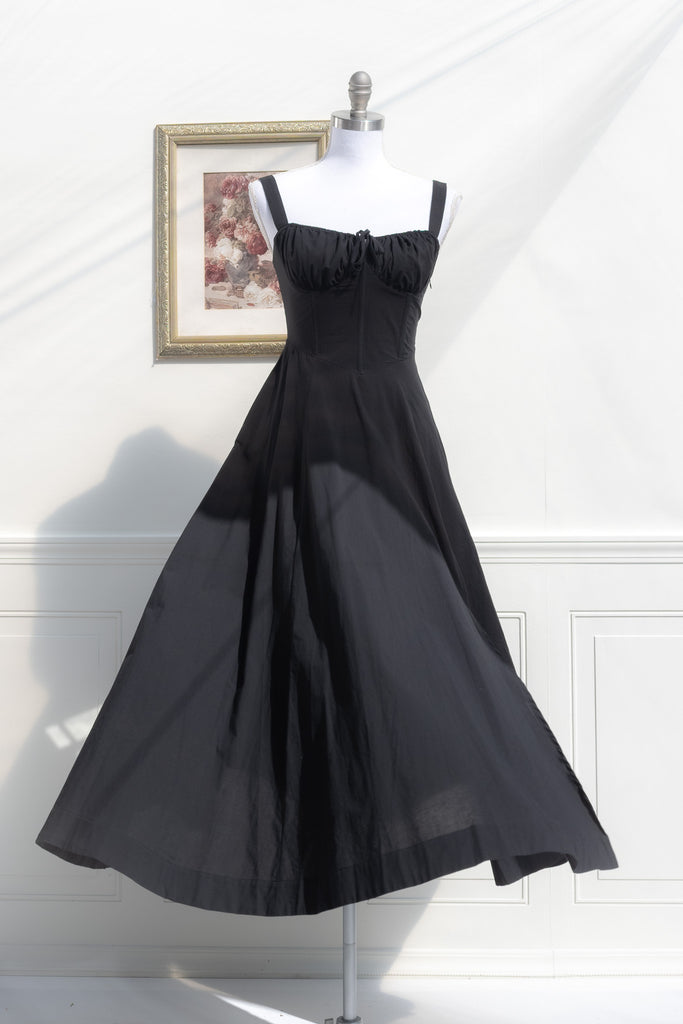 long black cottagecore dress - corset bust, shoulder straps, elegant cottage core dress for fall. front view. 