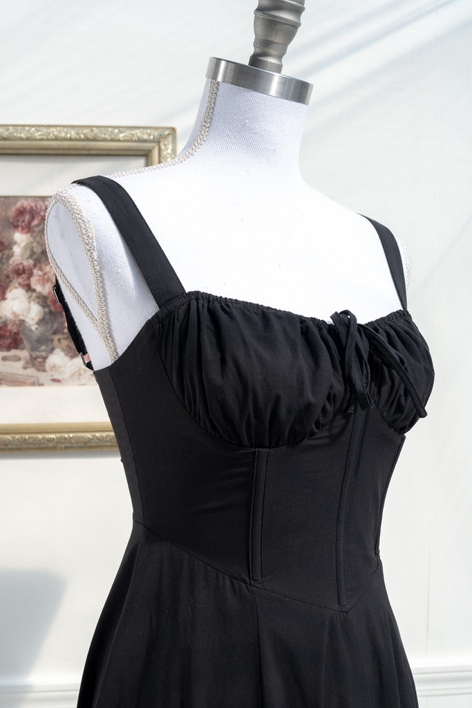cottagecore dress in black - up close bust view showing boning on corset. 