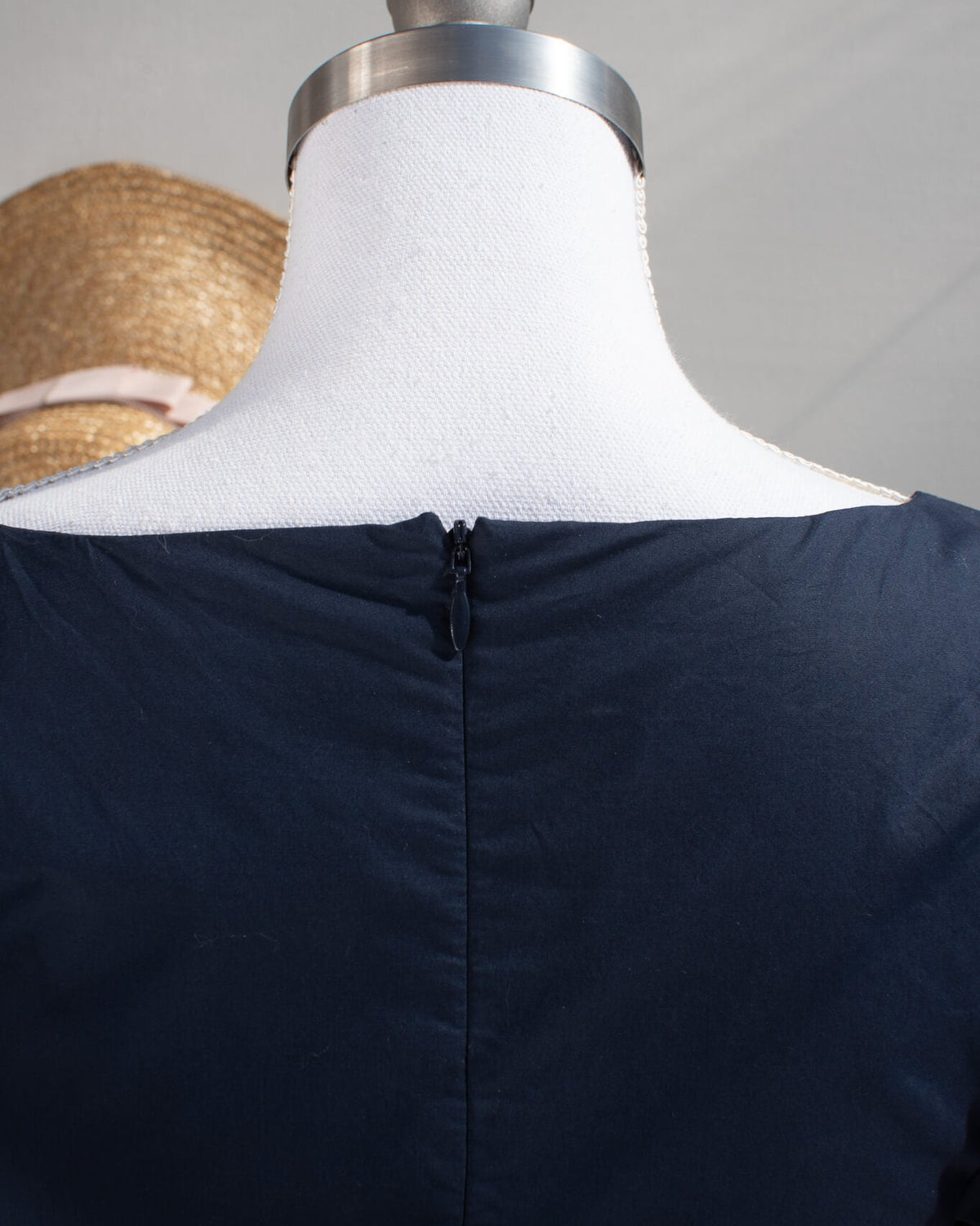 back neckline detail showing hidden zipper invisible zipper