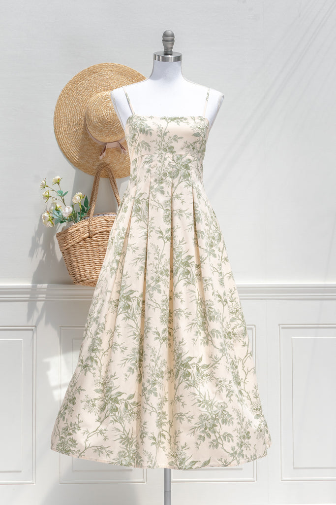 elegant green floral cotton dress - long green floral  dress with spaghetti straps and pleated skirt. french dress. Front view. 