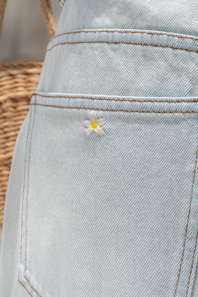 french girl style with tiny floral embroidery.