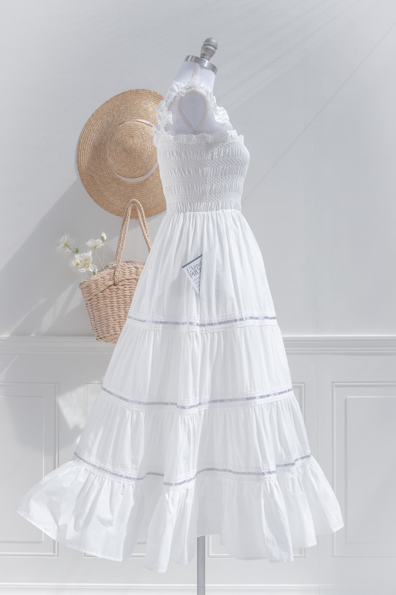 white cotton dresses Catalina Dress (S/10) The dress features a flattering square neckline that exudes a regal air White Cotton Smocked Midi Dress