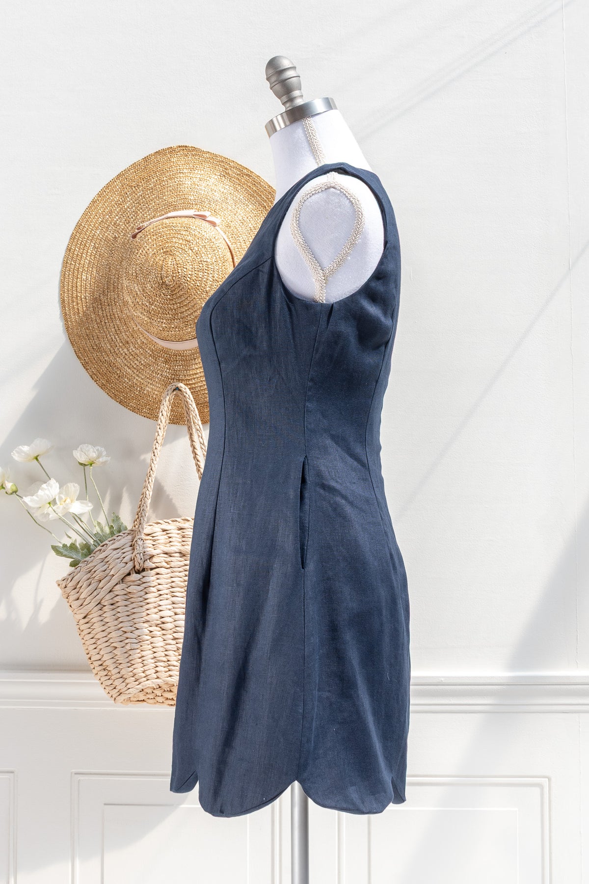 Navy linen cotton mini dress with structured silhouette side view