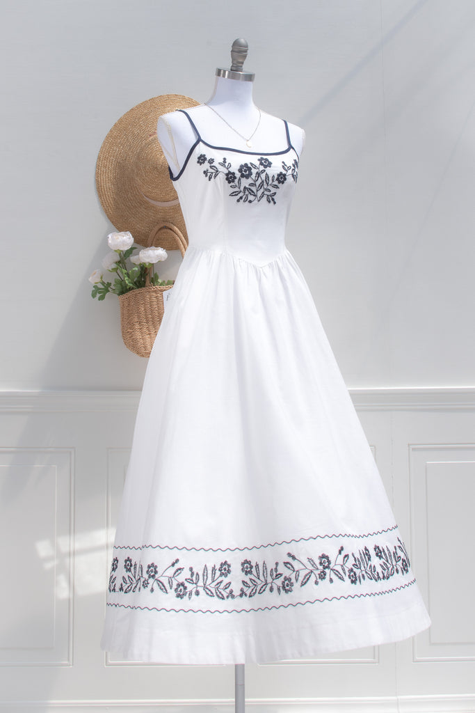 White Cotton Embroidered Midi Dress Navy Trim Floral Border | Amantine Medium White Cotton Embroidered Midi Dress Navy Trim Floral Border | Amantine Medium