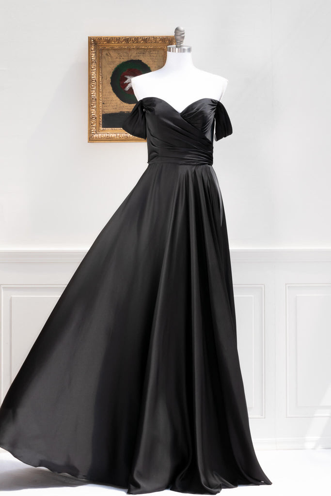 long black formal gown with structured bodice and wide skirt. a line. off the shoulder. feminine french style. 