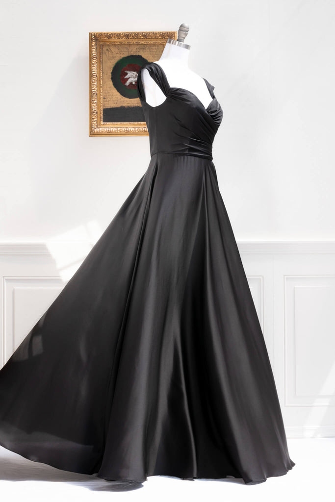 long black formal gown with structured bodice and wide skirt. a line. off the shoulder. feminine french style. 