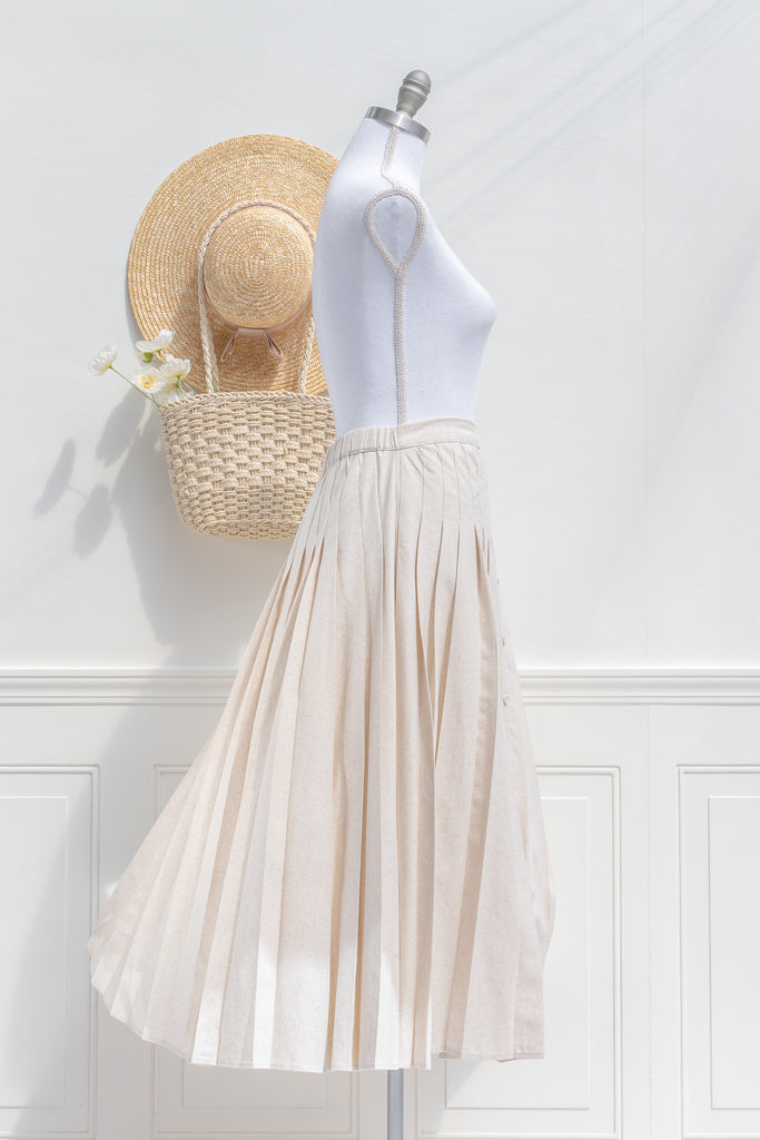 pleated elegant linen skirt french style. cottagecore skirt midi length - side view. 