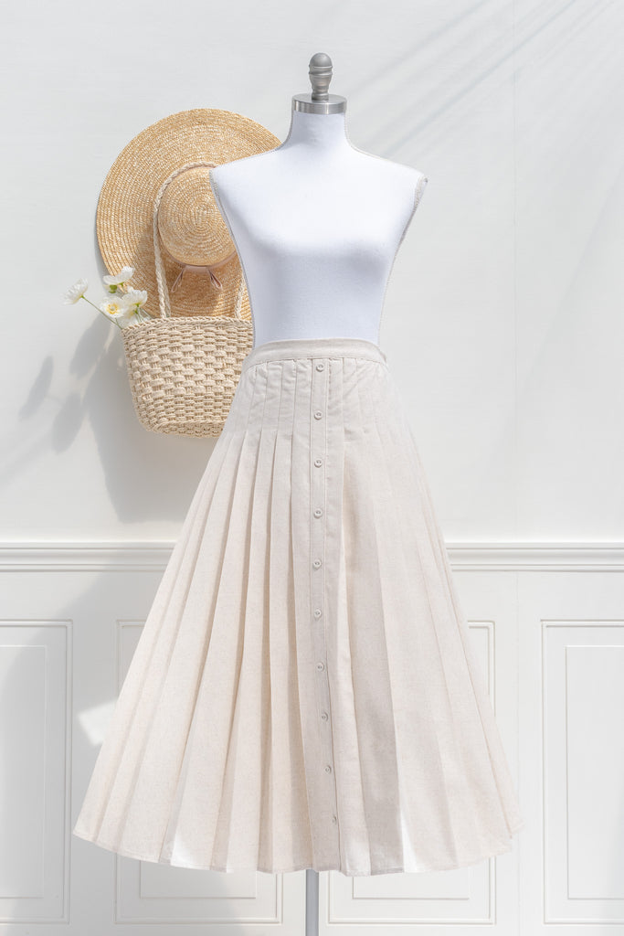 pleated elegant linen skirt french style. cottagecore skirt midi length - flaired view. 