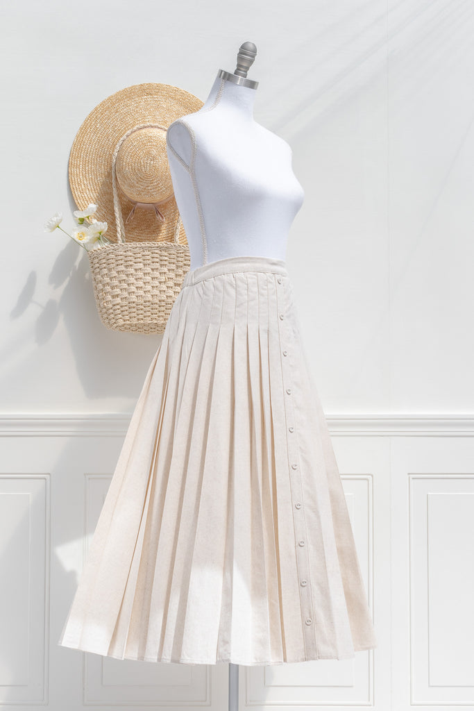 pleated elegant linen skirt french style. cottagecore skirt midi length - 3/4 side view. 