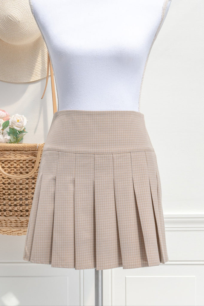cottagecore mini skirt. box pleat skirt in taupe. front view. 