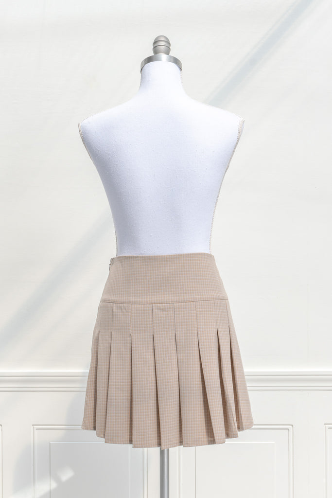 cottagecore mini skirt. box pleat skirt in taupe. front view. 