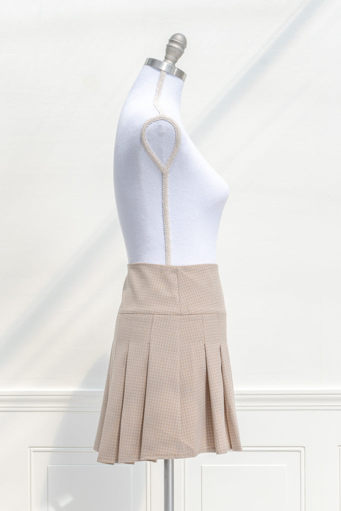 cottagecore mini skirt. box pleat skirt in taupe. front view. 