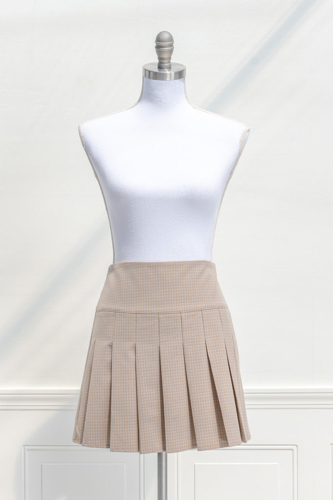 cottagecore mini skirt. box pleat skirt in taupe. front view. 