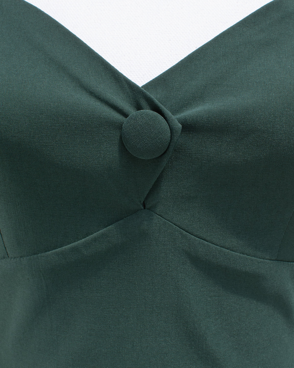Detail of bust of green vintage and french style dress from Amantine. 
