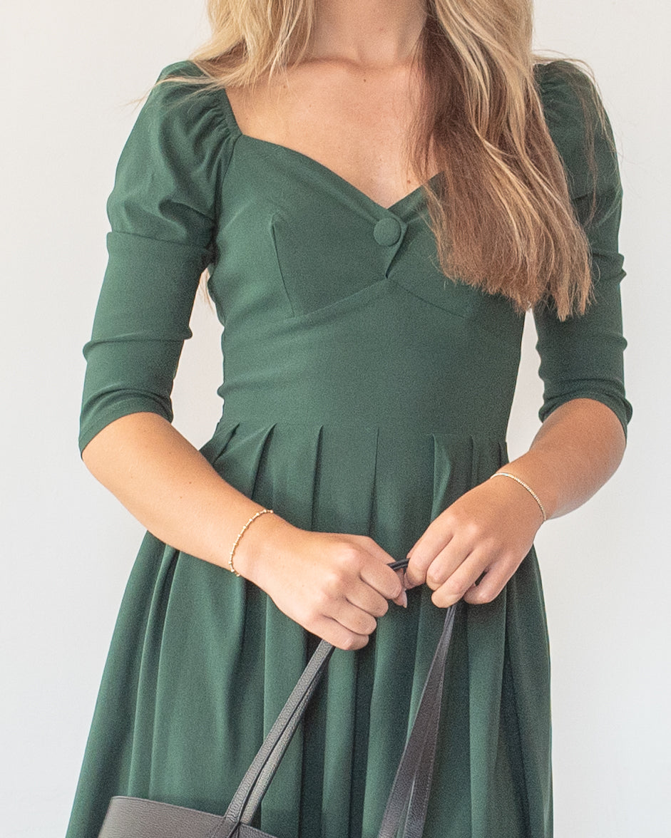 Green Retro Swing Dress. In French vintage style with modern ease featuring a sculpted sweetheart neckline, Amantine
